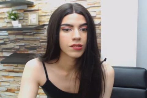Seductive brunette hair tranny Hard upright pecker