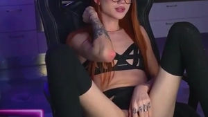Redhead Skinny Russian Tattooed lady-man In Glasses Strokes Her Girly ramrod On web camera